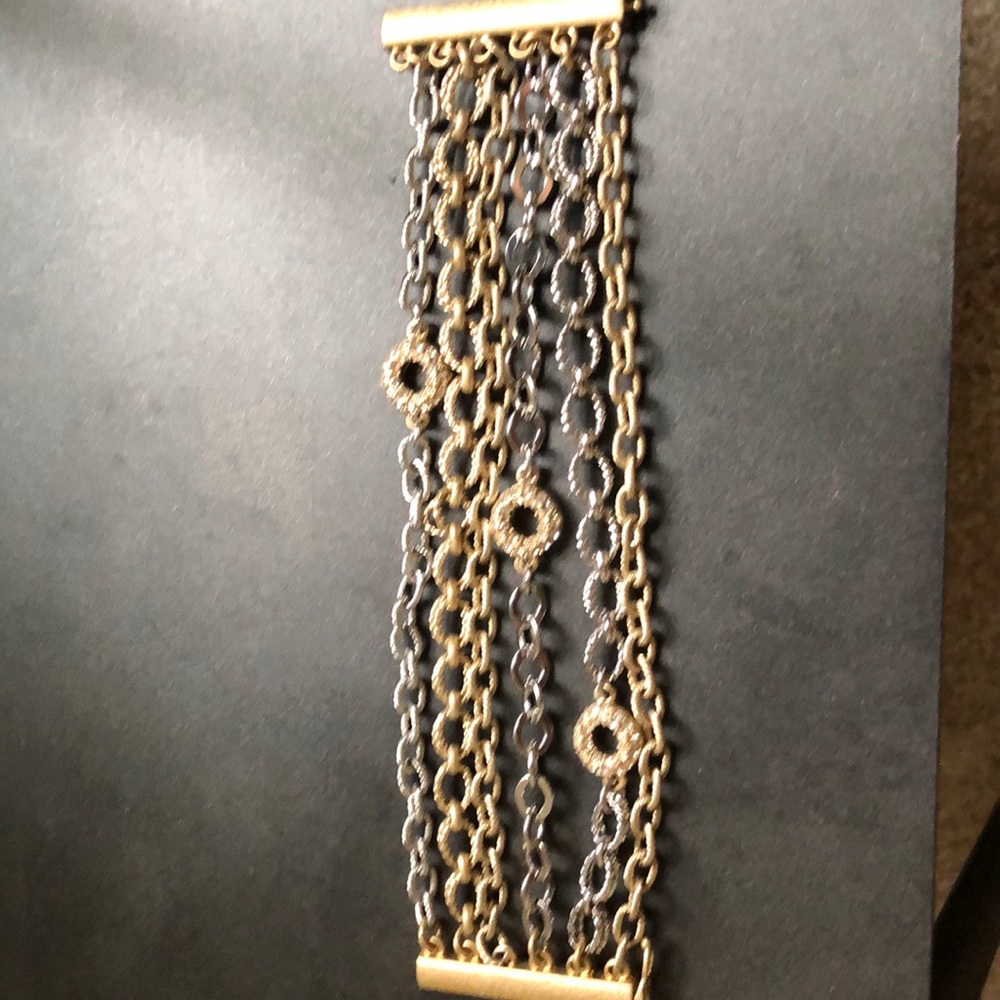 Silver and gold loft bracket